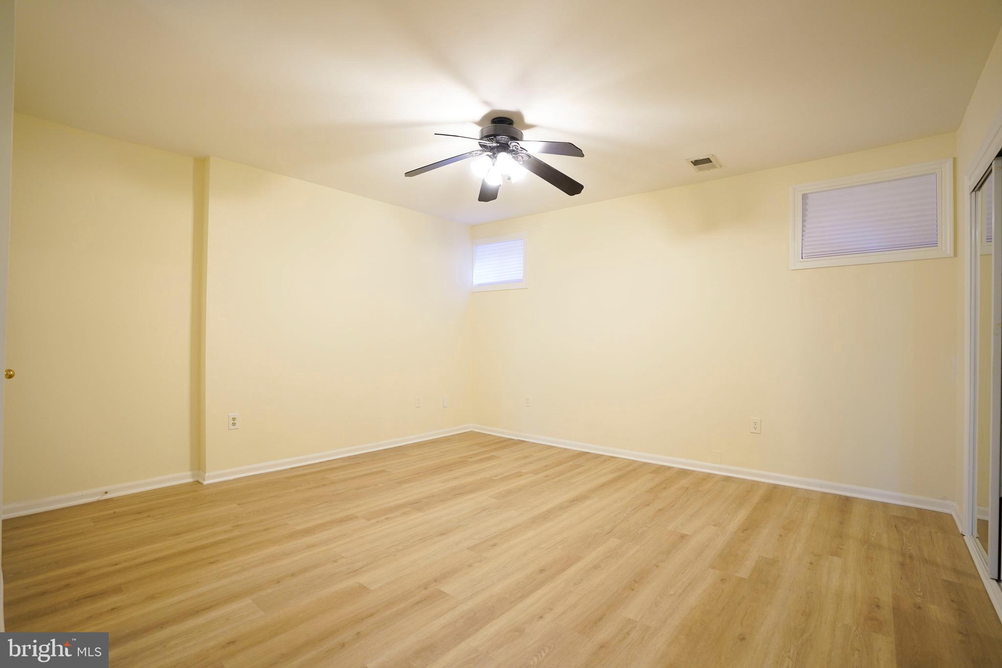 6903 Compton Lane Centreville, VA 20121 - Photo 28 of 35 a view of a room with wooden floor