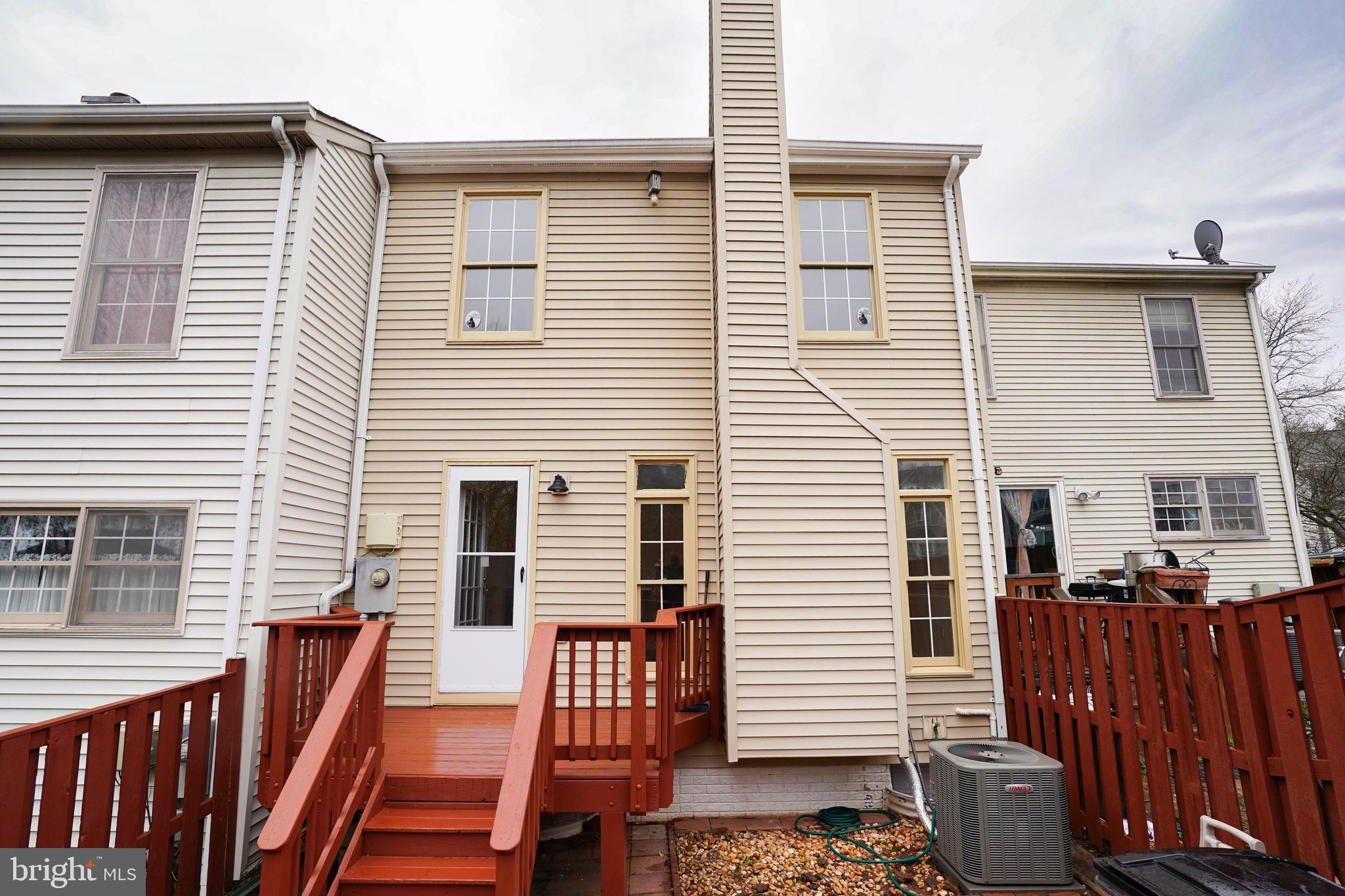 6903 Compton Lane Centreville, VA 20121 - Photo 33 of 35 a view of a patio with a table and chairs