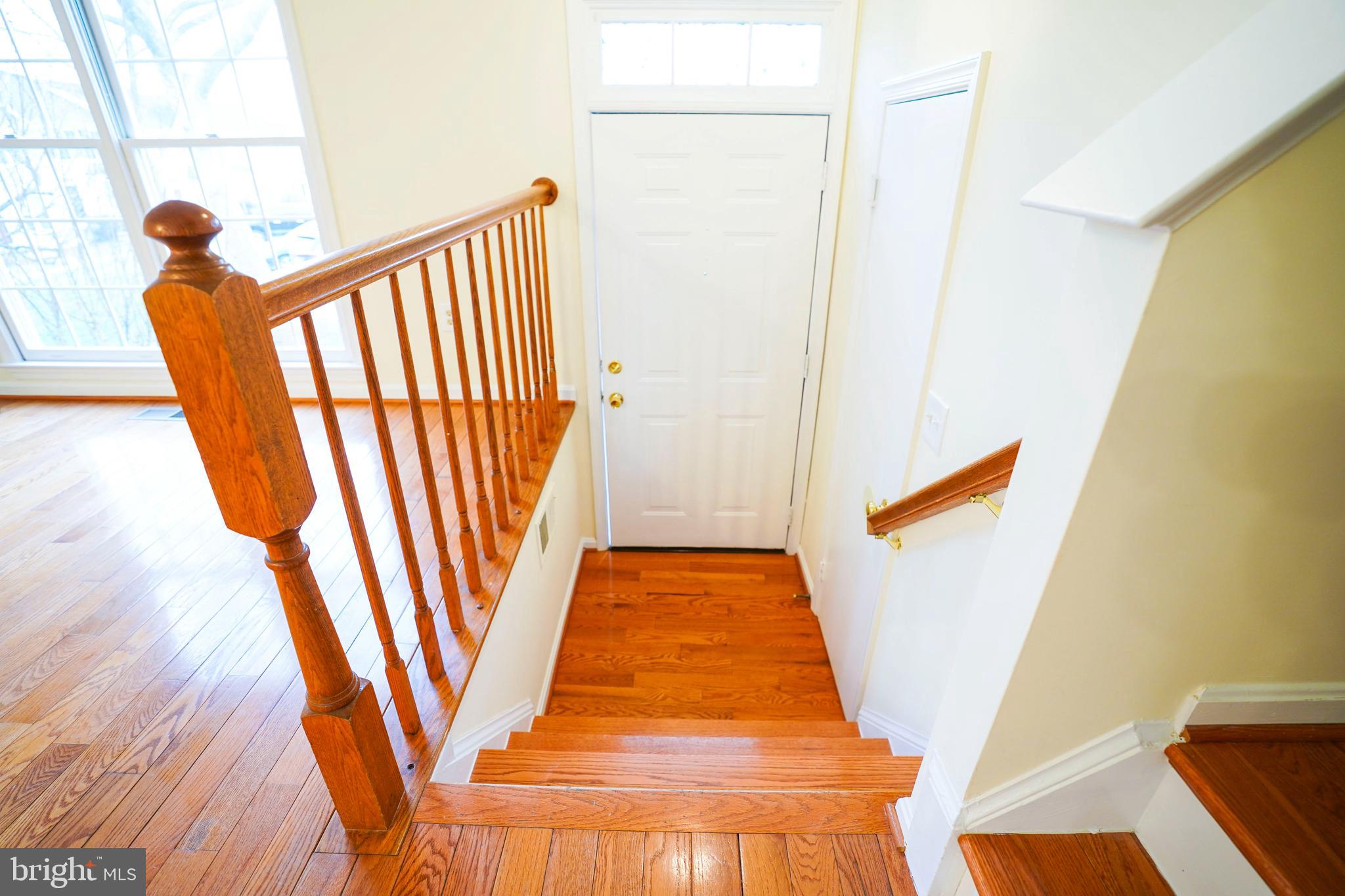 6903 Compton Lane Centreville, VA 20121 - Photo 4 of 35 a view of entryway with wooden floor