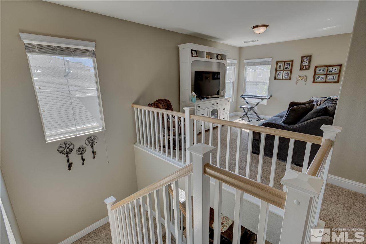 7638 Corso Street Reno, NV 89506 - Photo 12 of 29 a view of a livingroom with furniture and a window