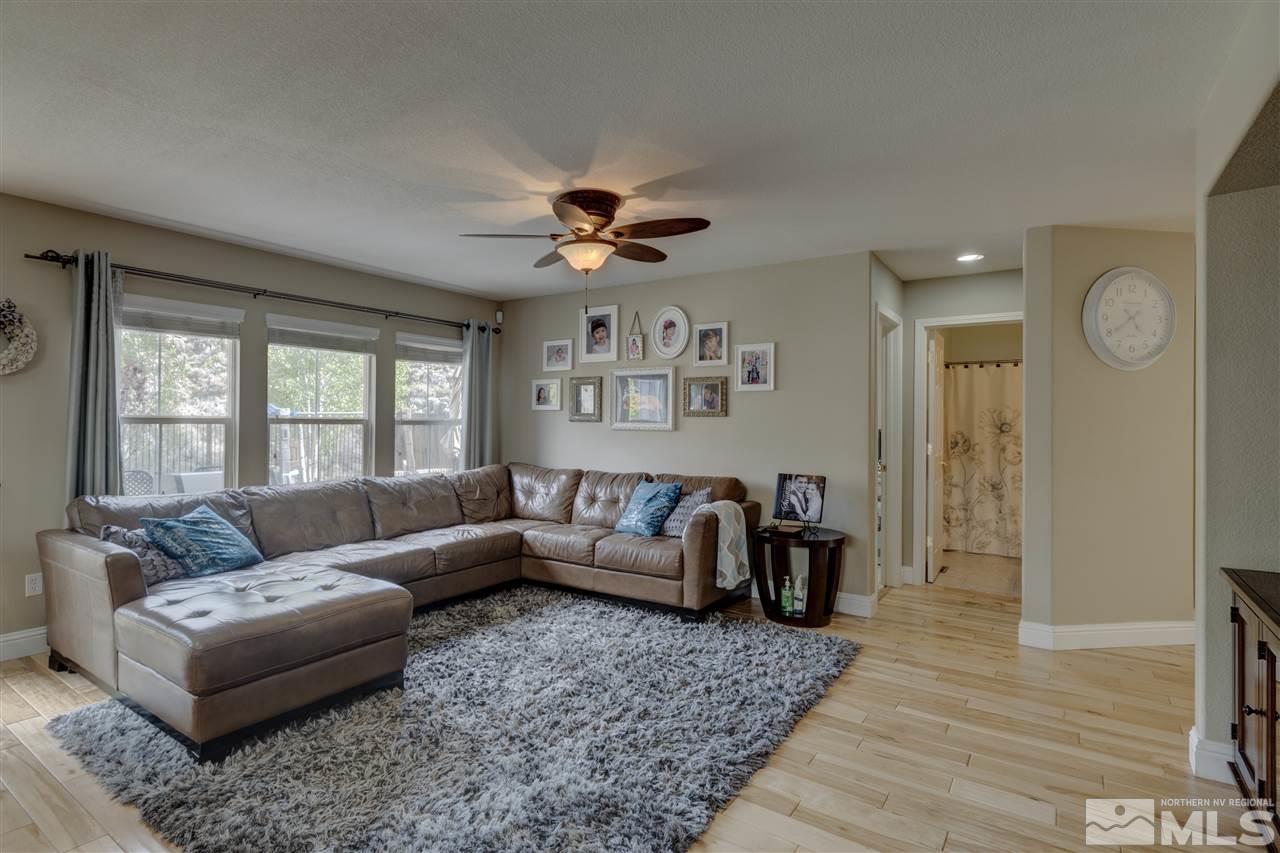 7638 Corso Street Reno, NV 89506 - Photo 13 of 29 a living room with furniture and a large window