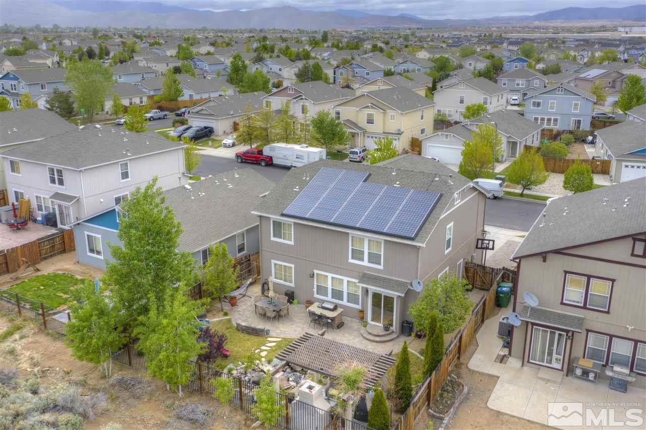 7638 Corso Street Reno, NV 89506 - Photo 2 of 29 an aerial view of multiple house with a yard