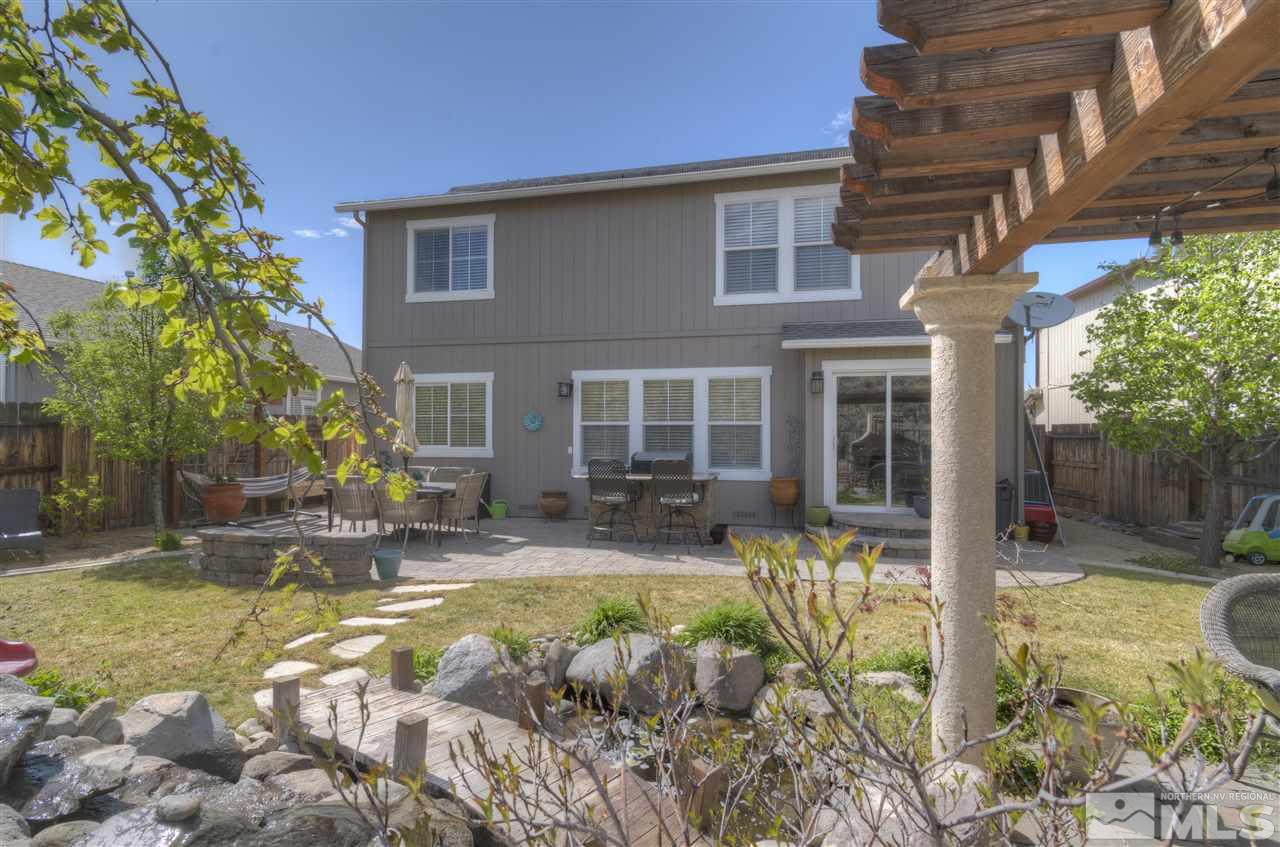 7638 Corso Street Reno, NV 89506 - Photo 24 of 29 a view of house with outdoor seating