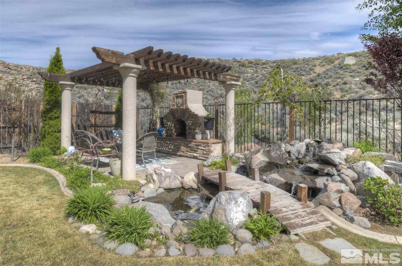 7638 Corso Street Reno, NV 89506 - Photo 27 of 29 a view of a chairs and table in patio