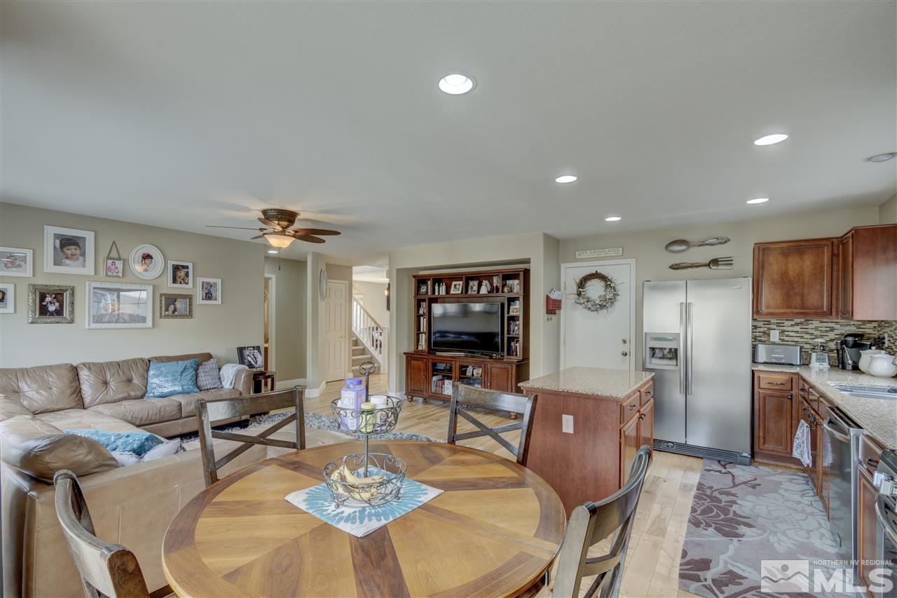 7638 Corso Street Reno, NV 89506 - Photo 7 of 29 a living room with furniture and wooden floor