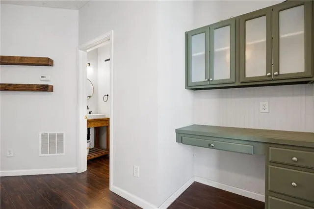 a view of entryway with wooden floor