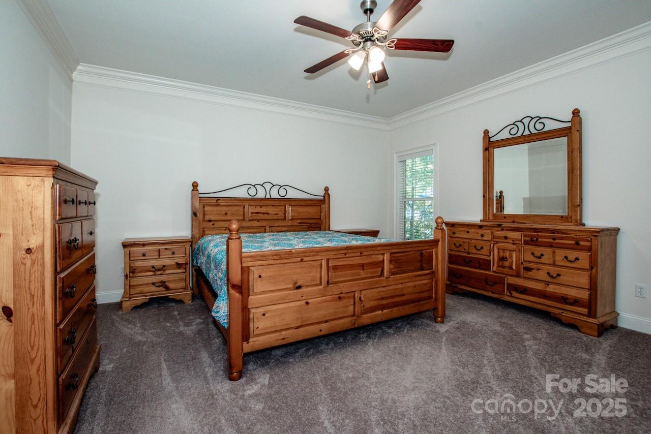 3545 Maple Brook Drive Denver, NC 28037 - Photo 19 of 40 a room with a bed and furniture