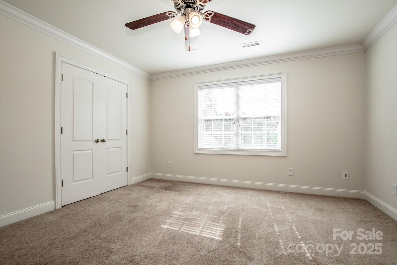 3545 Maple Brook Drive Denver, NC 28037 - Photo 28 of 40 a view of an empty room with a window
