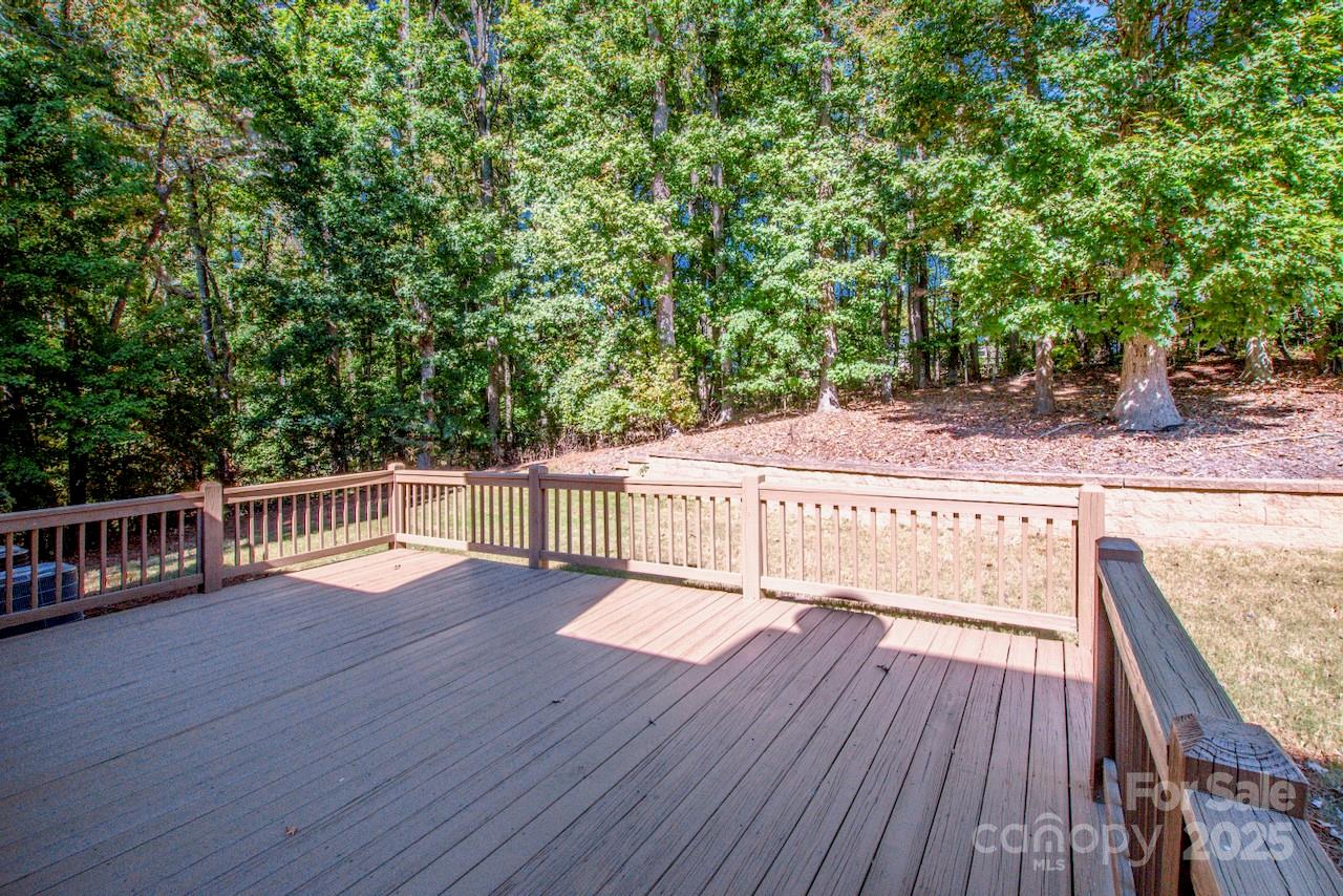 3545 Maple Brook Drive Denver, NC 28037 - Photo 37 of 40 a view of balcony with wooden floor and fence
