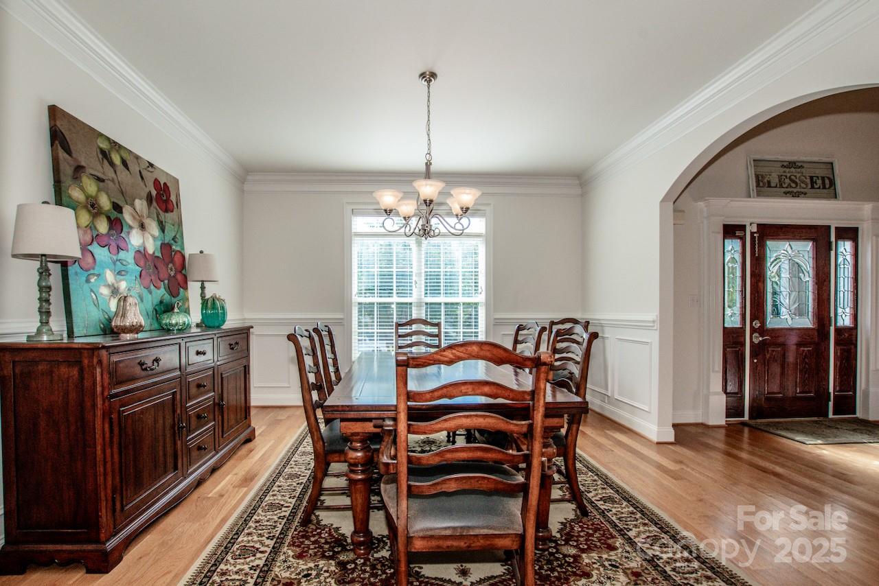 3545 Maple Brook Drive Denver, NC 28037 - Photo 9 of 40 a view of a dining room with furniture window and wooden floor