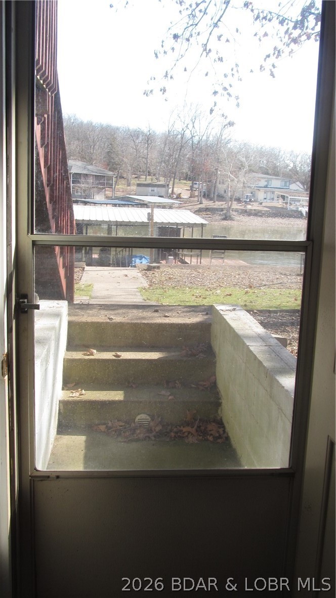 144 Chipmunk Drive Edwards, MO 65326 - Photo 23 of 40 Walk out lower level is convenient for swimmer to