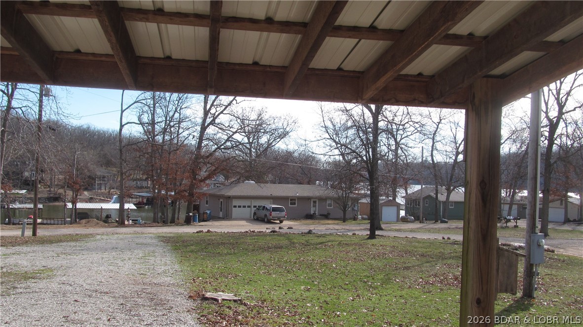 144 Chipmunk Drive Edwards, MO 65326 - Photo 30 of 40 View of Lake Home from Carport of Barn-shaped Gara