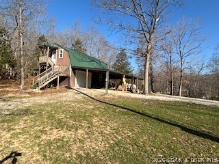 144 Chipmunk Drive Edwards, MO 65326 - Photo 33 of 40 This 3.9 acres with carport and 2 car Garage and u