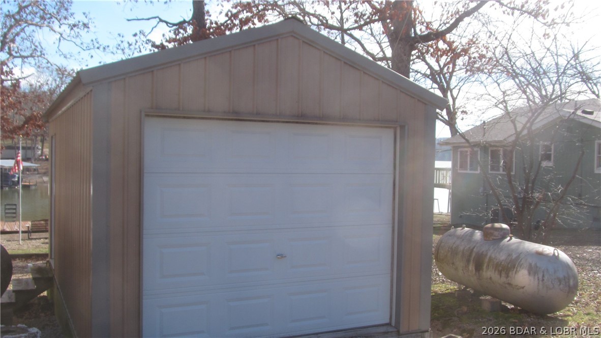 144 Chipmunk Drive Edwards, MO 65326 - Photo 8 of 40 1 car garage sitting next to home is included!