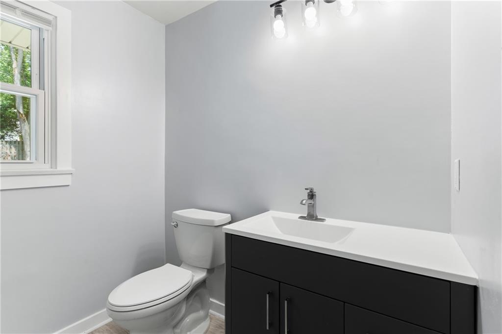 4030 Circle Drive Allison Park, PA 15101 - Photo 21 of 41 a bathroom with a sink a toilet and a mirror