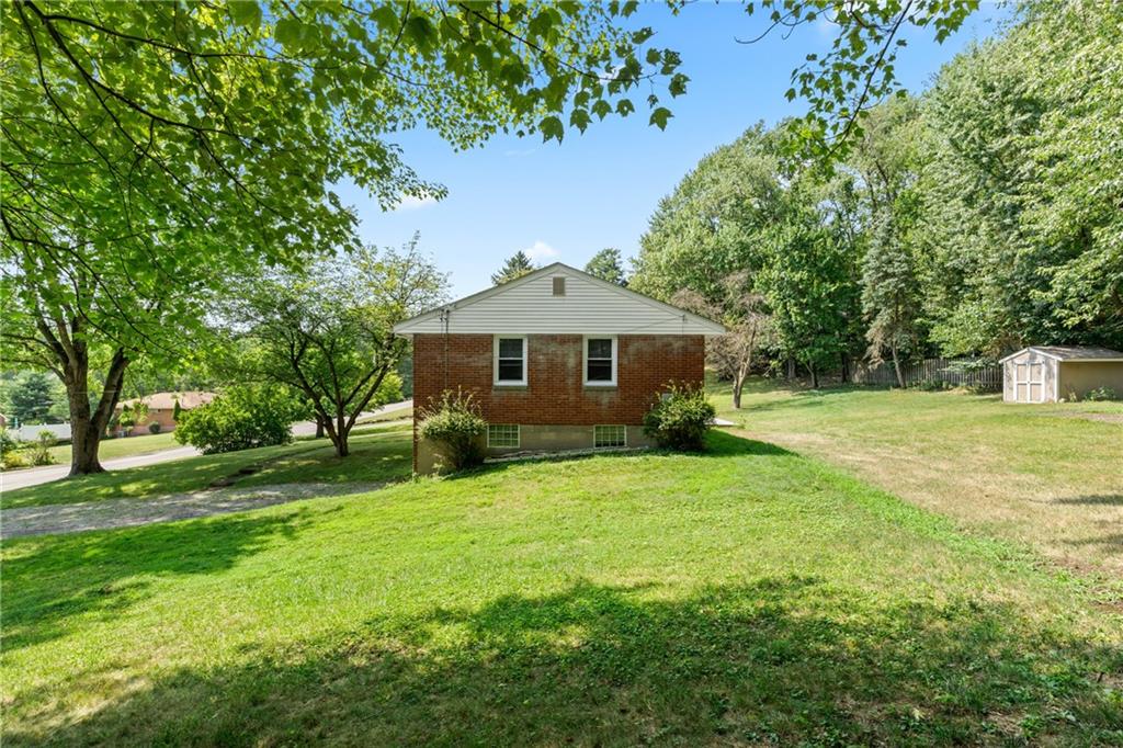 4030 Circle Drive Allison Park, PA 15101 - Photo 36 of 41 a front view of a house with a yard