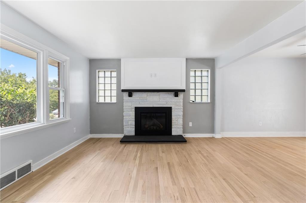 4030 Circle Drive Allison Park, PA 15101 - Photo 7 of 41 wooden floor fireplace and windows in an empty room