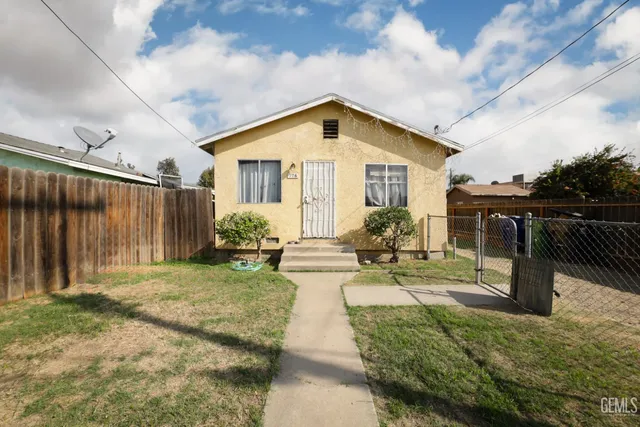 a house with trees in front of it
