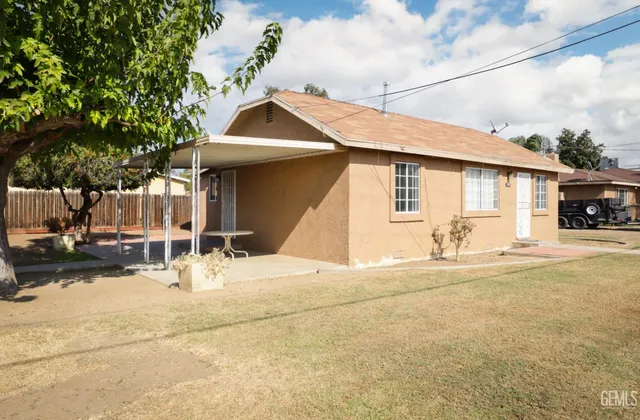 a view of a street with a building in the background