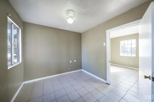 a view of an empty room with a bathroom