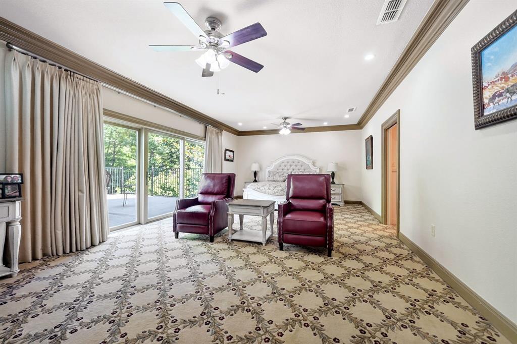 1901 Rose Pointe Athens, TX 75752 - Photo 16 of 37 Spacious room featuring patterned carpeting and crown molding
