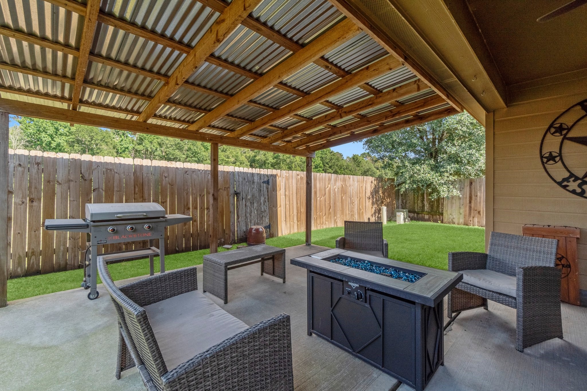 28987 Birch Green Way Spring, TX 77386 - Photo 30 of 32 a backyard of a house with table and chairs