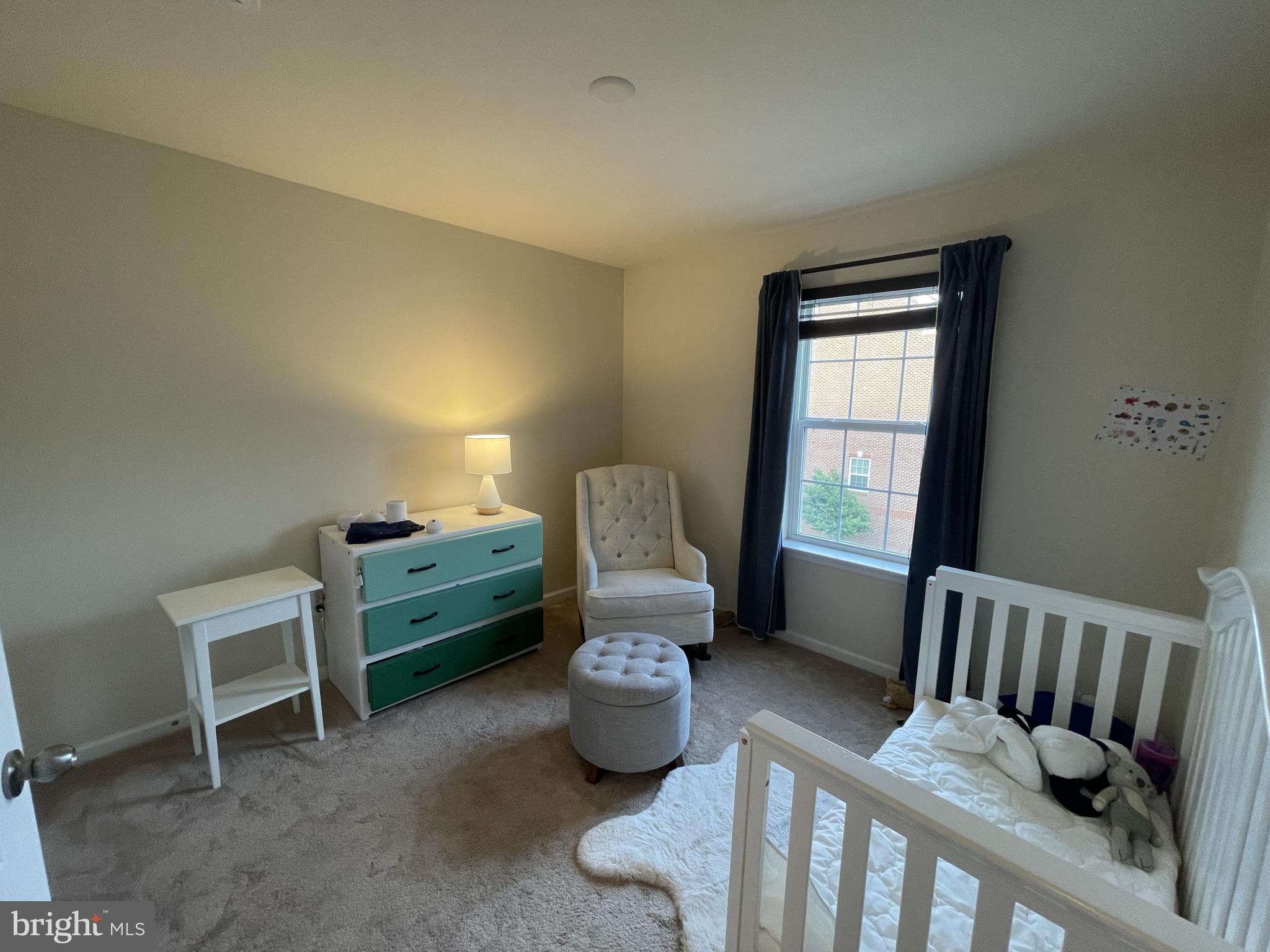 7563 Crowley Street Hanover, MD 21076 - Photo 10 of 15 a bedroom with furniture and a window