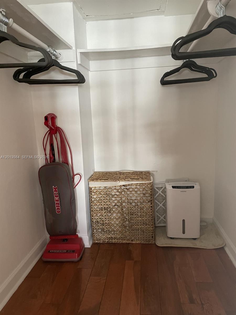 1500 Bay Road, Unit 1142S Miami Beach, FL 33139 - Photo 6 of 8 a view of front door with wooden floor