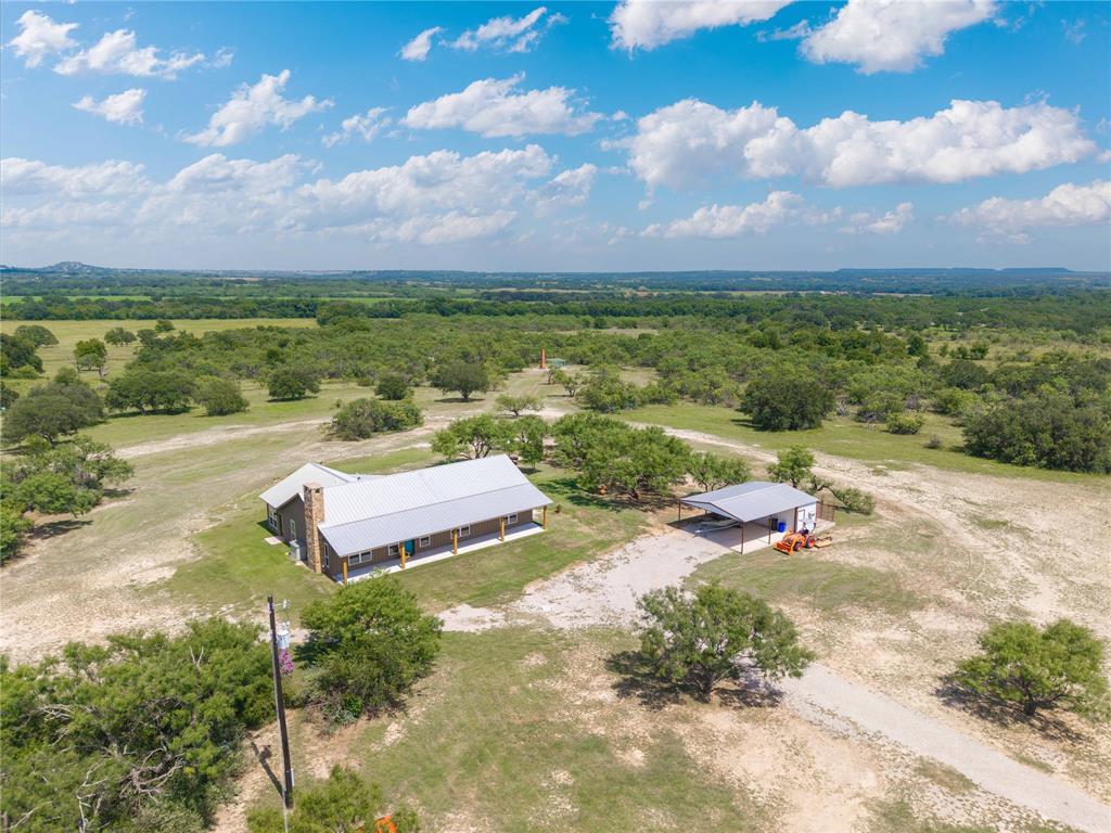 11253 County Road 525 May, TX 76857 - Photo 12 of 40 a view of a lake with a yard