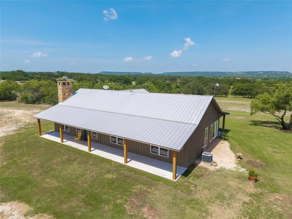 11253 County Road 525 May, TX 76857 - Photo 14 of 40 a view of a terrace with yard and mountain view in back