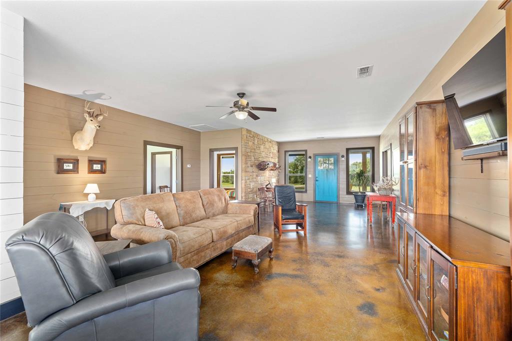 11253 County Road 525 May, TX 76857 - Photo 22 of 40 a living room with furniture and a flat screen tv