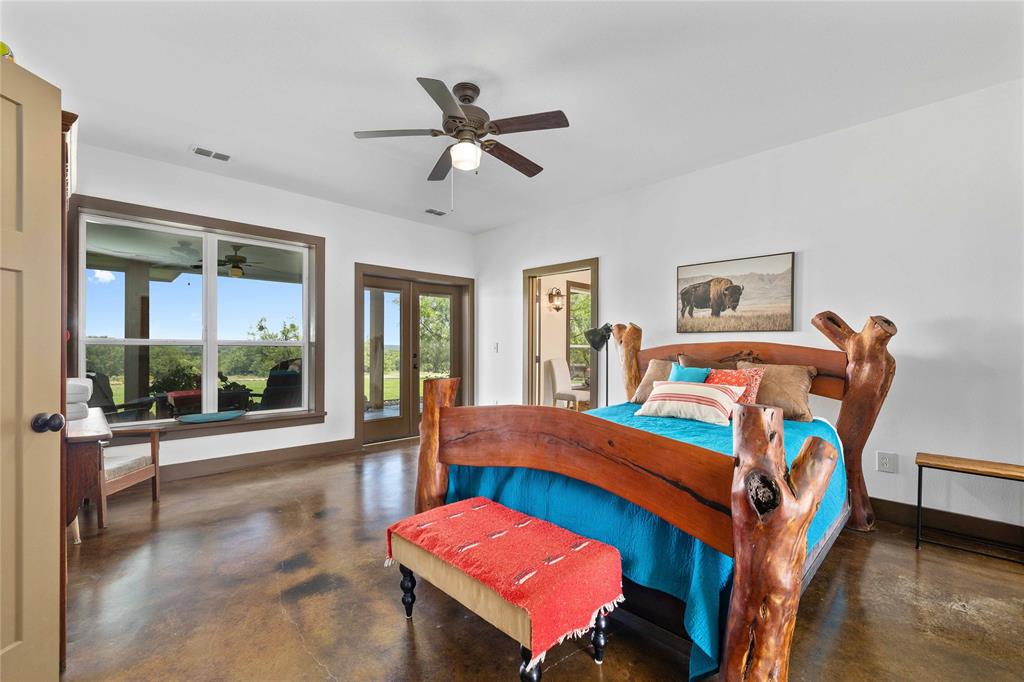 11253 County Road 525 May, TX 76857 - Photo 27 of 40 a bedroom with two beds and window