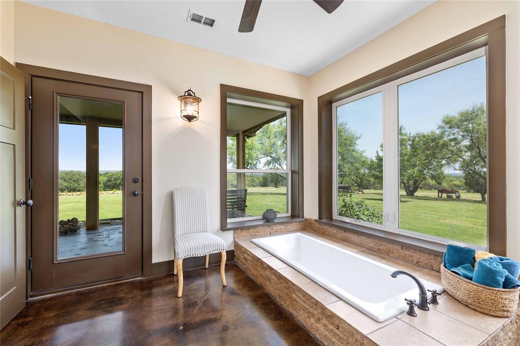 11253 County Road 525 May, TX 76857 - Photo 30 of 40 a room with pool table and windows