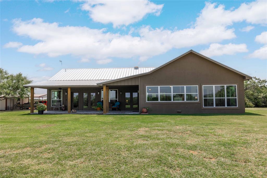 11253 County Road 525 May, TX 76857 - Photo 38 of 40 a view of a house with a yard and sitting area
