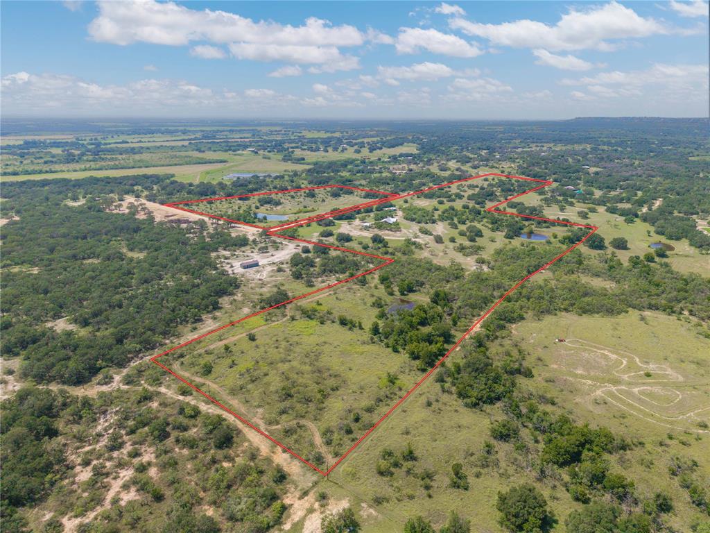 11253 County Road 525 May, TX 76857 - Photo 5 of 40 a view of a city with mountains in the background