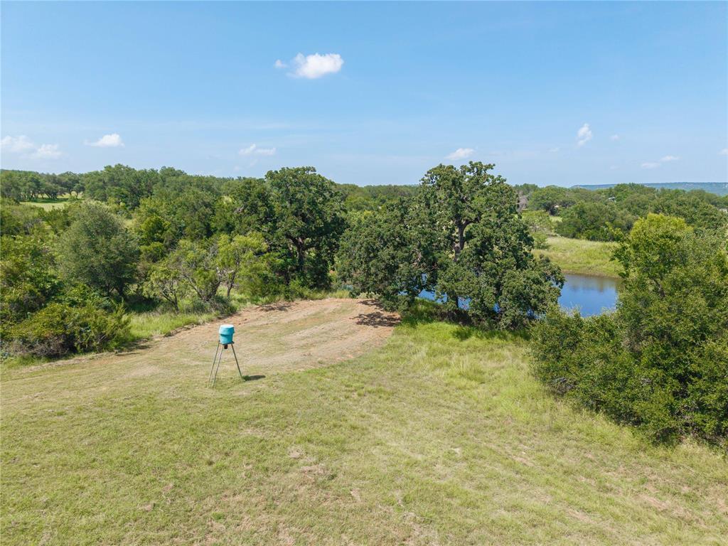 11253 County Road 525 May, TX 76857 - Photo 8 of 40 a view of a outdoor space and a yard