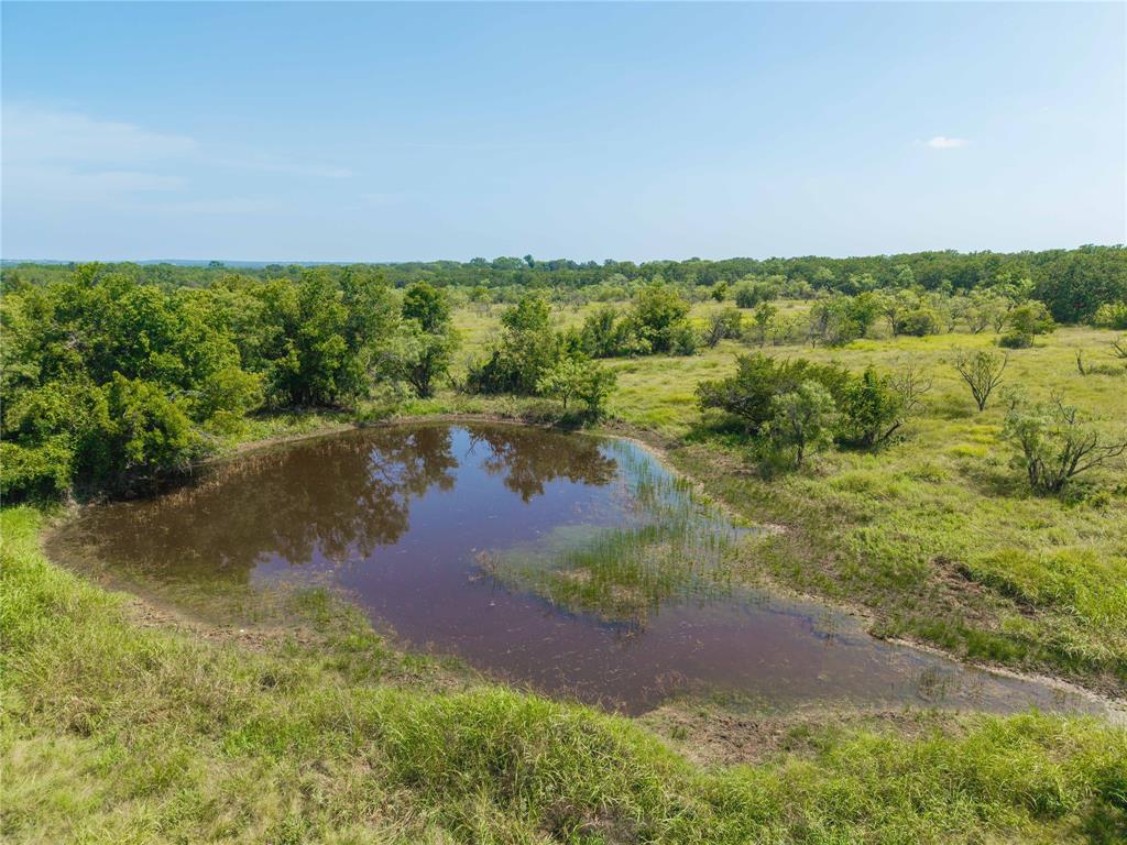 11253 County Road 525 May, TX 76857 - Photo 10 of 40 a view of a lake with houses in the back
