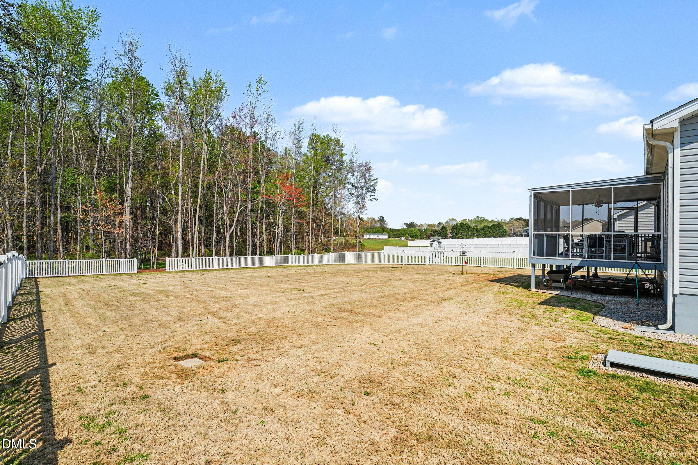 130 Aylebury Ridge Zebulon, NC 27597 - Photo 28 of 41 a swimming pool with outdoor seating and yard