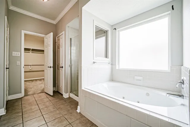 a bathroom with a sink vanity and mirror