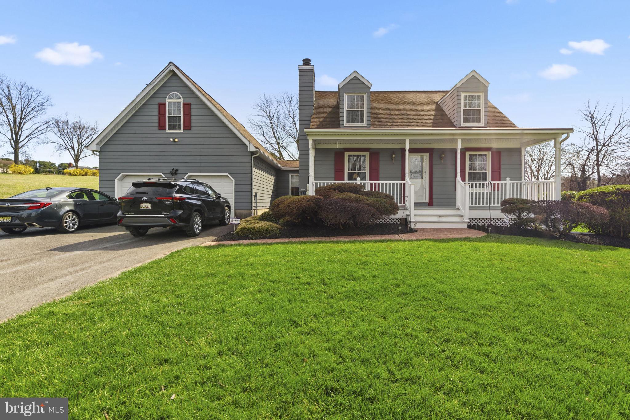 3831 Wilkinson Road Havre de Grace, MD 21078 - Photo 40 of 51 a front view of a house with a garden and plants