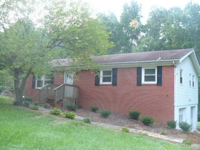 601 Poplar Drive Raleigh, NC 27603 - Photo 1 of 4 front view of a house with a yard