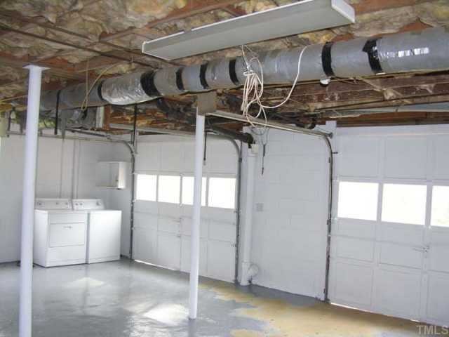 601 Poplar Drive Raleigh, NC 27603 - Photo 4 of 4 a utility room with dryer and washer