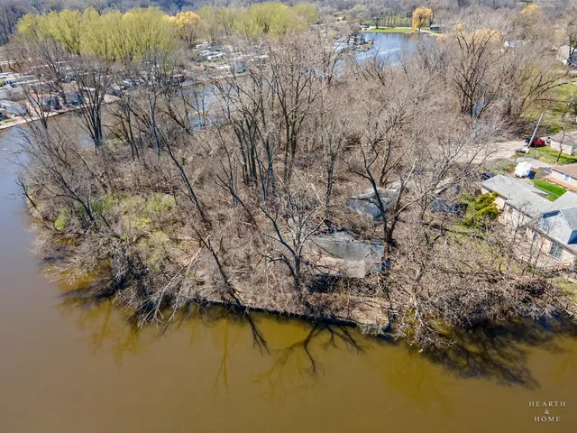 a view of an ocean with trees