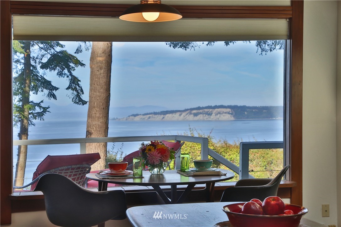 6924 Sills Road Clinton, WA 98236 - Photo 16 of 25 a living room with furniture and a window