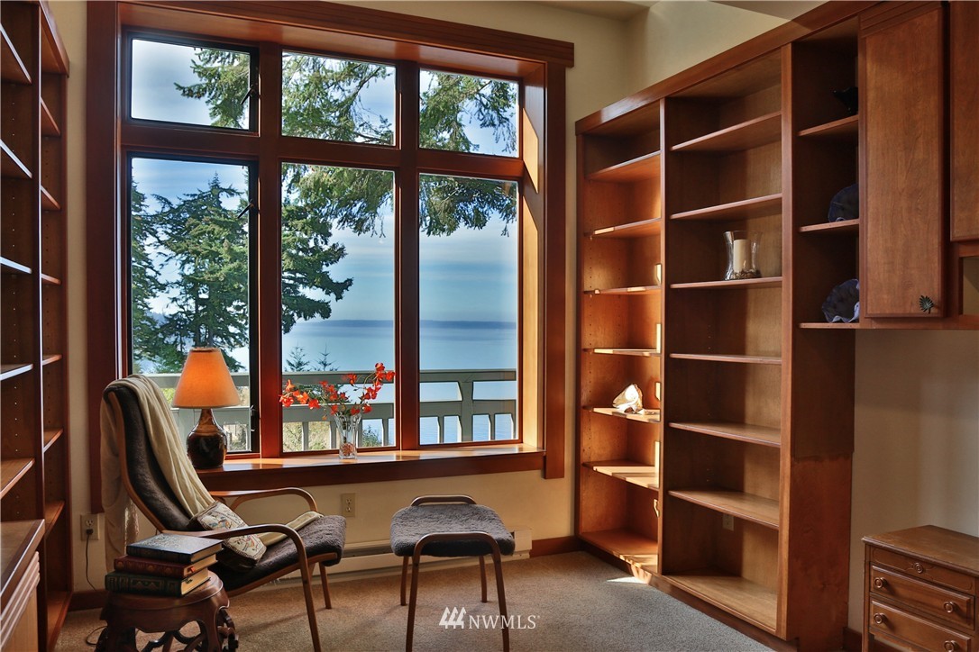 6924 Sills Road Clinton, WA 98236 - Photo 10 of 25 a view of a workspace with furniture and a window