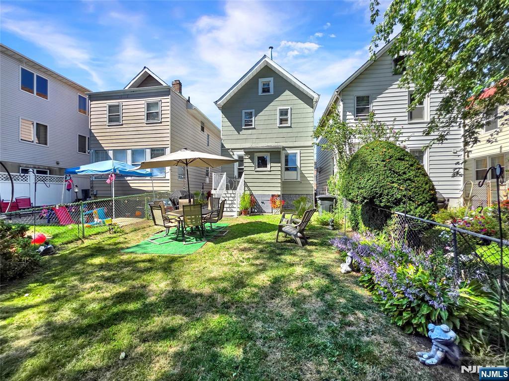 438 Forest Street Kearny, NJ 07032 - Photo 11 of 38 a view of house with a outdoor space