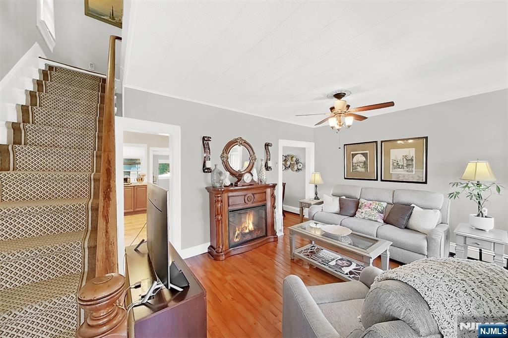 438 Forest Street Kearny, NJ 07032 - Photo 18 of 38 a living room with furniture and a wooden floor