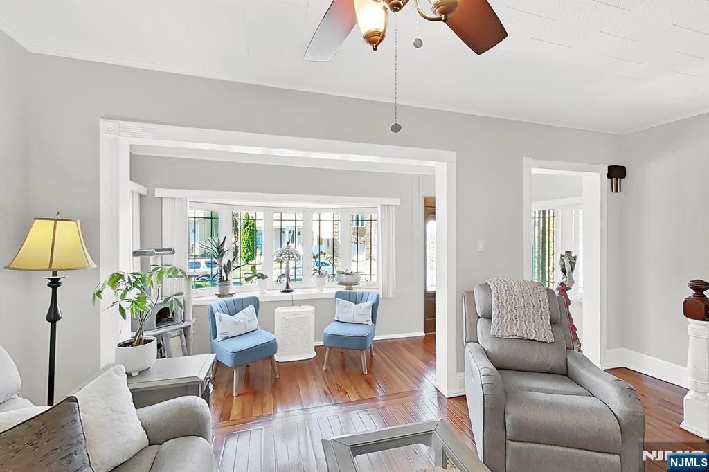 438 Forest Street Kearny, NJ 07032 - Photo 20 of 38 a living room with furniture and a large window