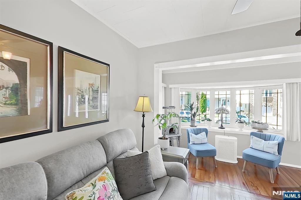 438 Forest Street Kearny, NJ 07032 - Photo 21 of 38 a living room with furniture and a large window