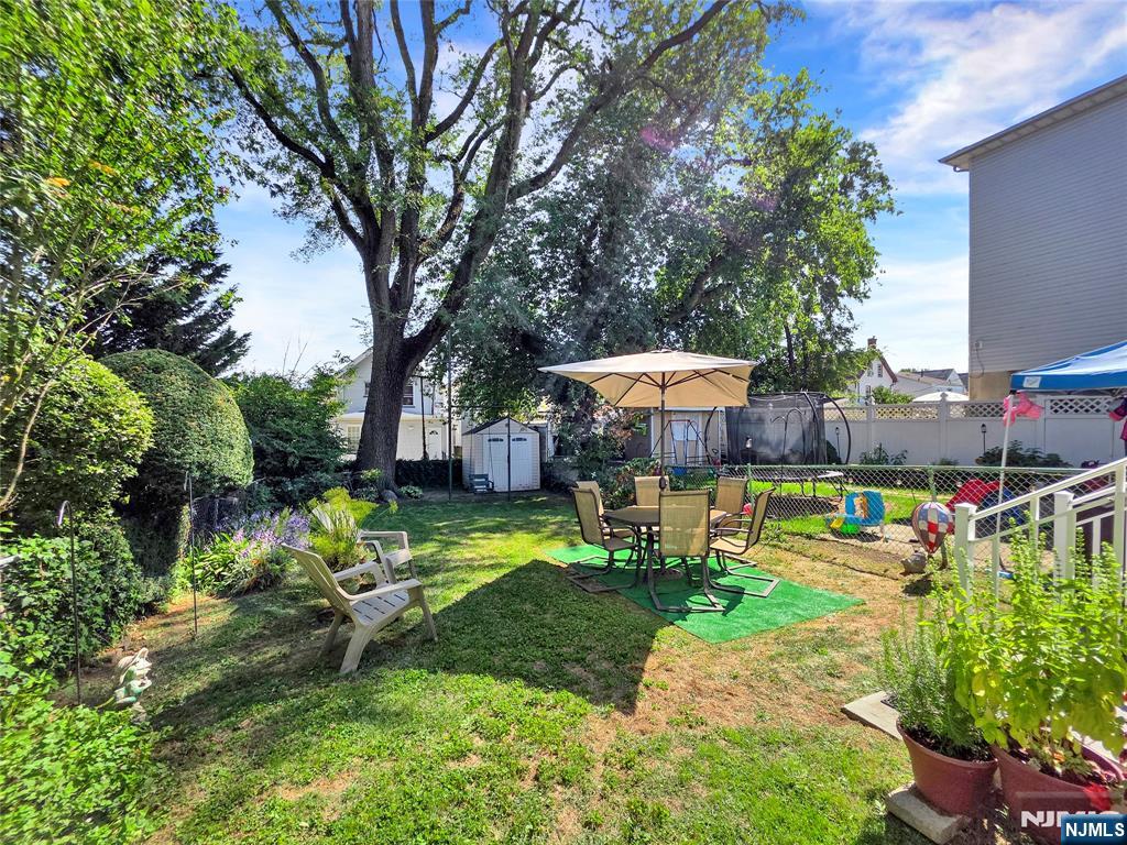 438 Forest Street Kearny, NJ 07032 - Photo 5 of 38 a garden view with a seating space